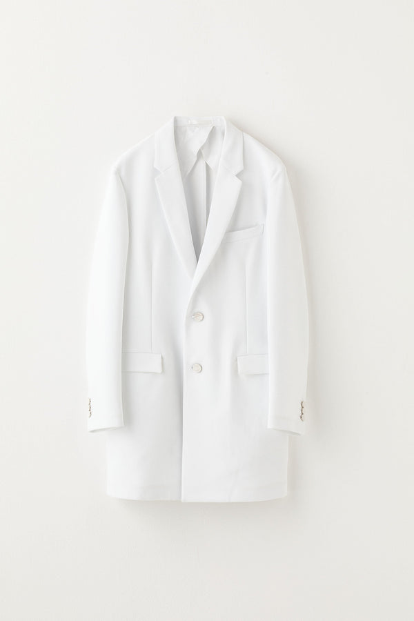 White blazer on a light gray background