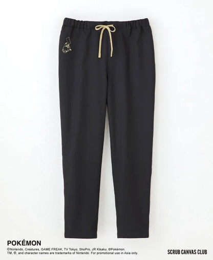 A unisex medical scrub pants from the Classico Pokémon collection, featuring subtle yellow fabric and pikachu character.